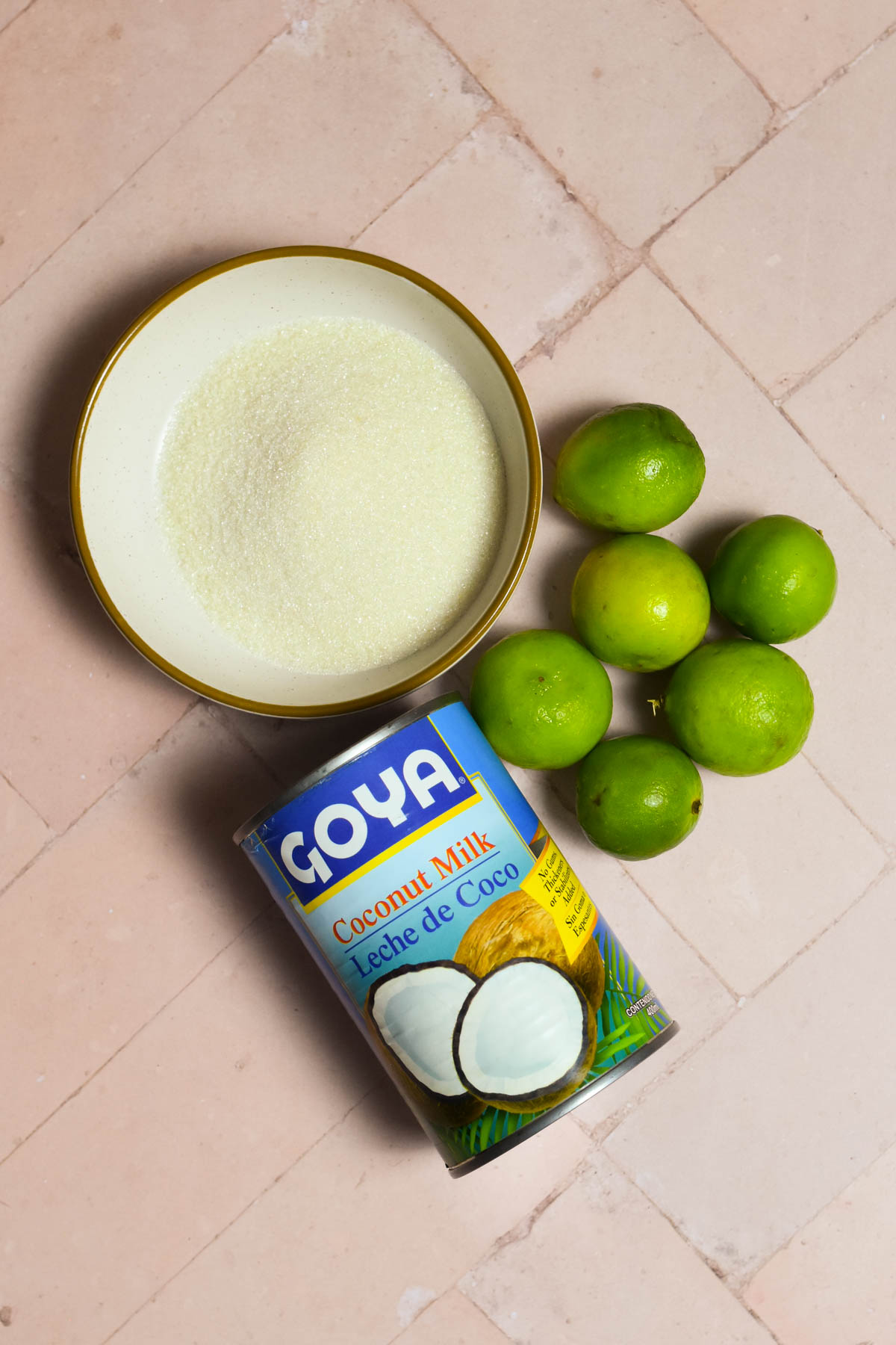 Overhead shot of ingredients needed for limonada de coco. 